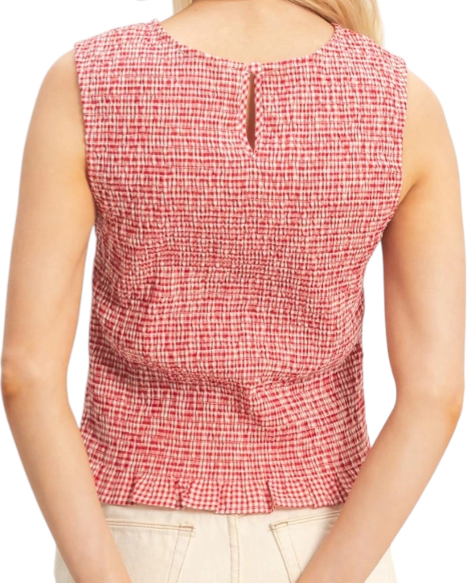 Red and white checkered sleeveless top worn by a person on a white background.