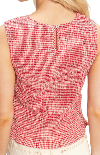 Back of a Red and white checkered sleeveless top worn by a person on a white background.