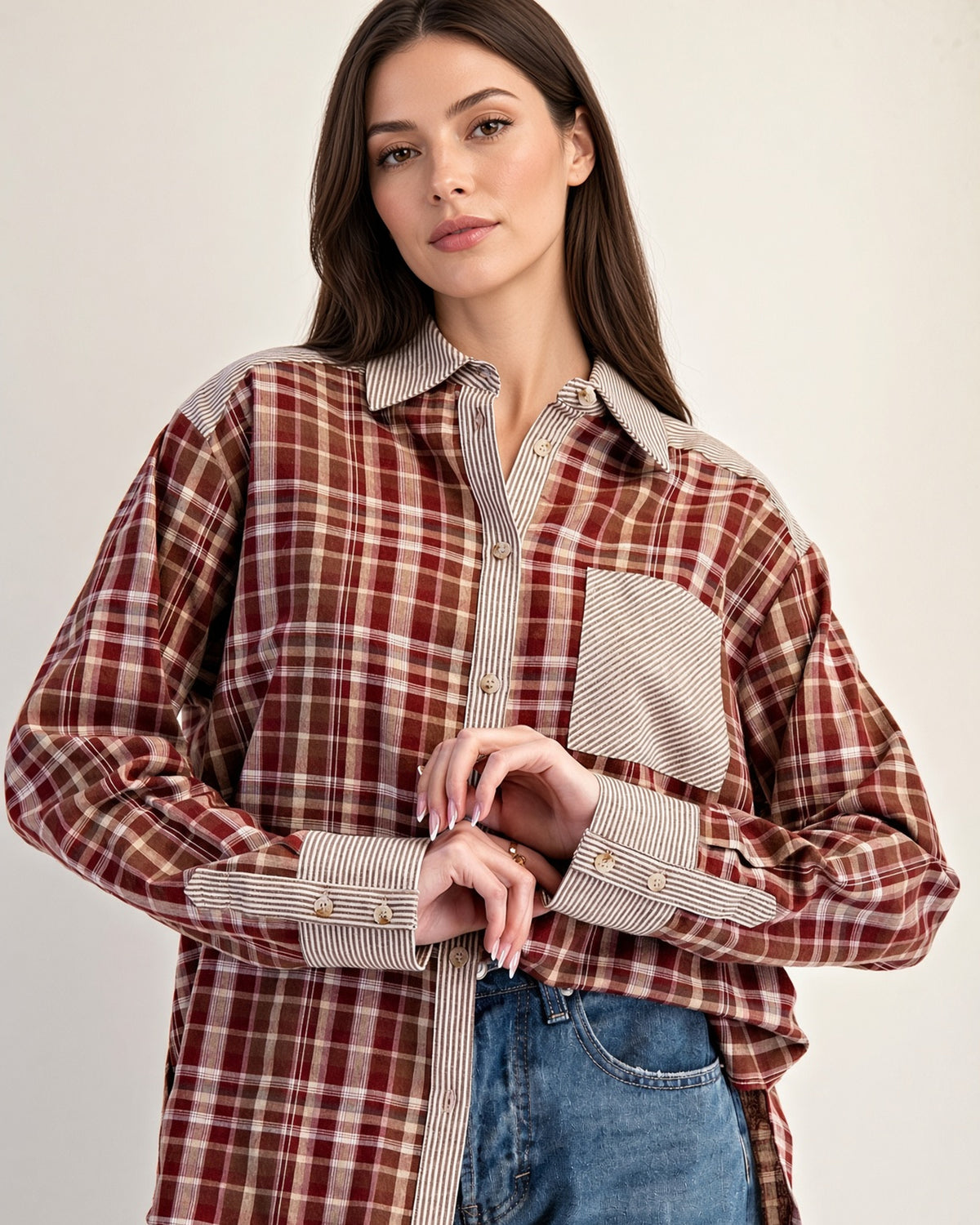Rust plaid cotton button-up shirt with striped collar, button placket, chest pocket, and cuffs.