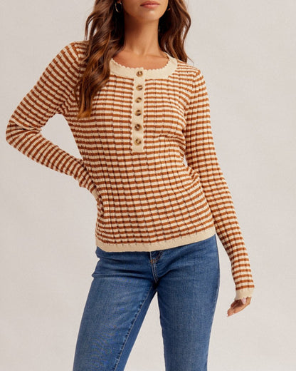 Spiced Pointelle Cotton Henley Top in rust and cream with contrast neckline and button front worn with blue jeans.