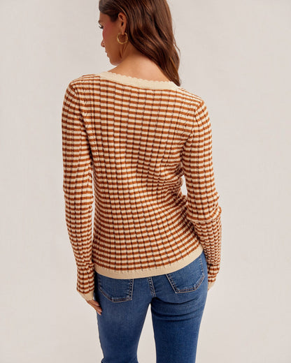 Back view of Spiced Pointelle Cotton Henley Top in rust and cream