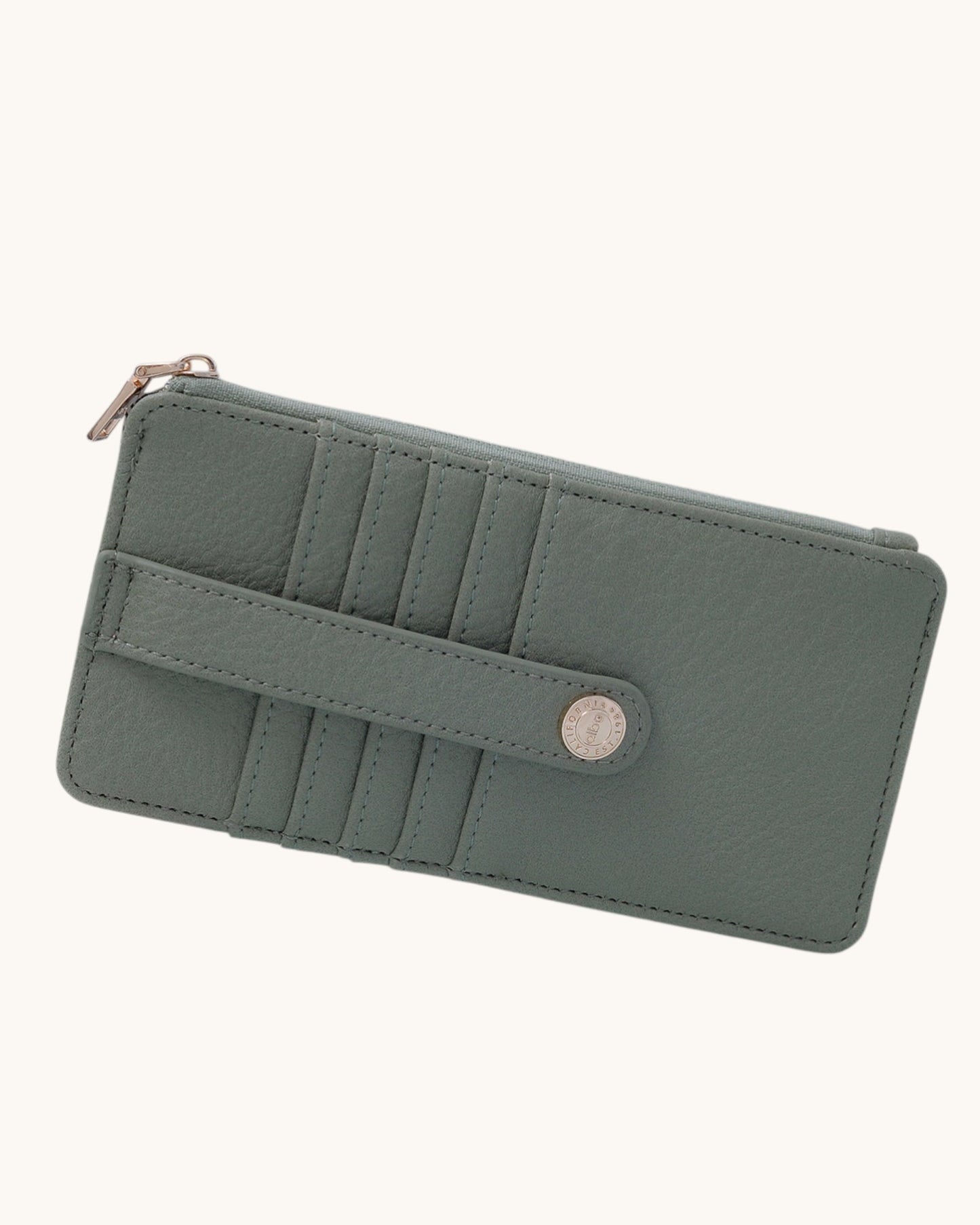 Sage wallet with a strap on a white background.