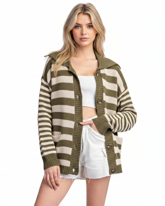 Woman wearing a green and taupe cardigan button up sweater.