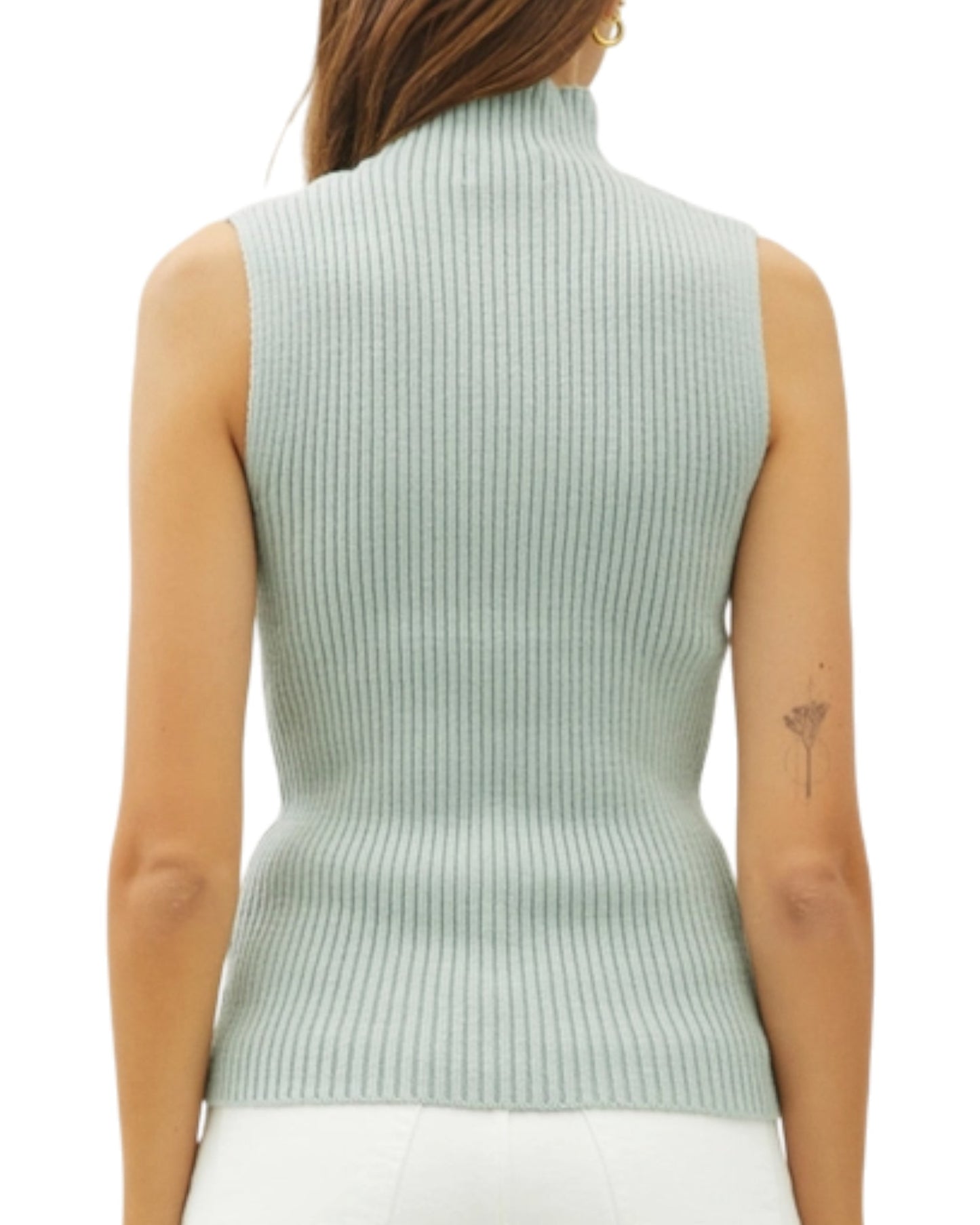 Seafoam ribbed sleeveless sweater worn by a model on a white background.