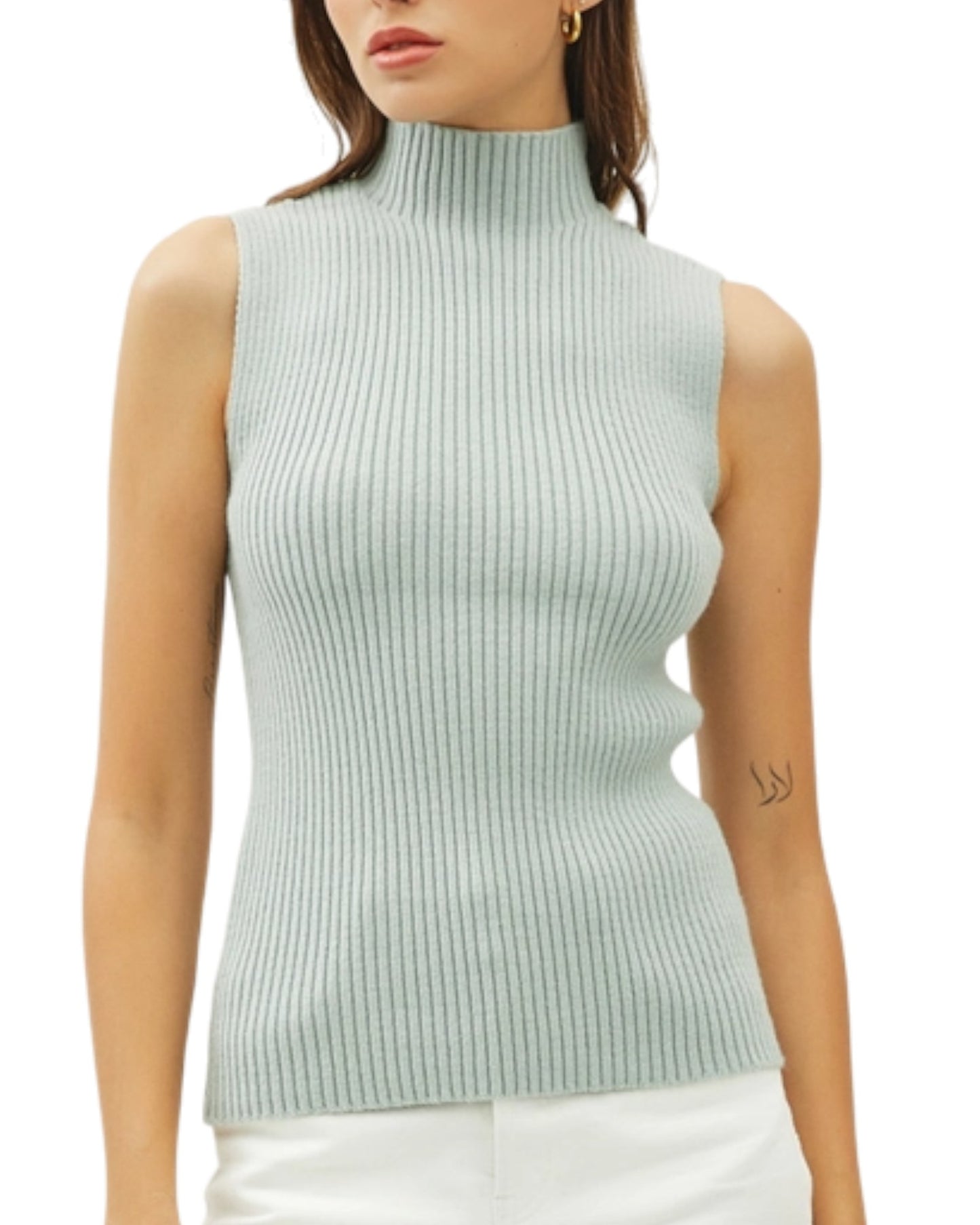 Seafoam ribbed sleeveless sweater worn by a model on a white background.