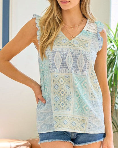 Sleeveless ruffle top with sea green mosaic print and lace trim neckline.