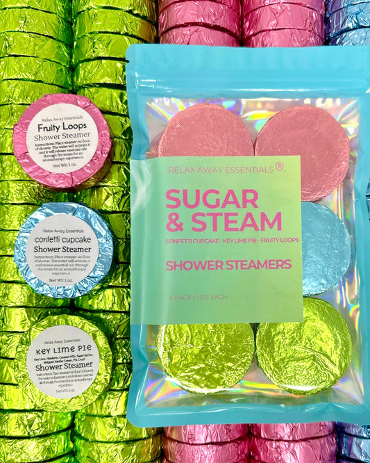 Packaged shower steamers with colorful packaging and visible brand name.