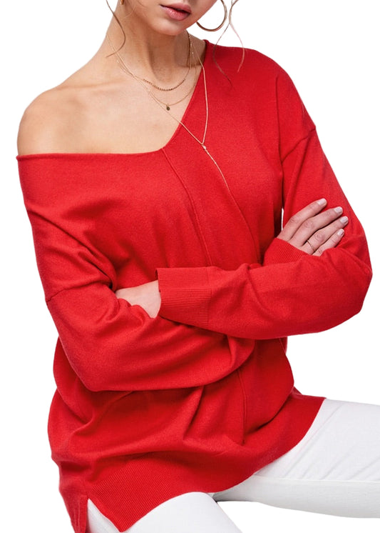 Woman wearing a red long-sleeve v-neck top on a white background.