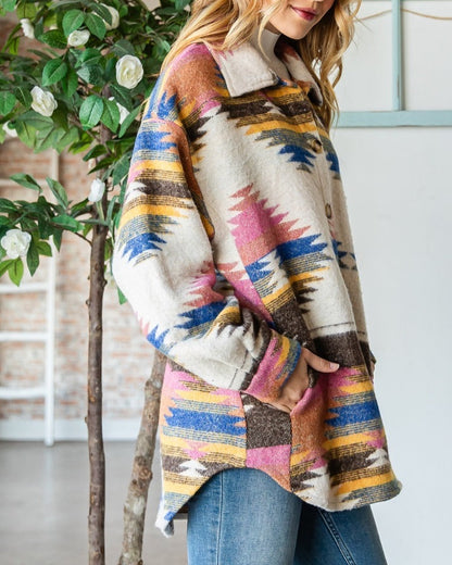 Ivory shacket with multicolor Southwest pattern and oversized fit.