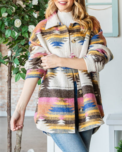 Ivory shacket with multicolor Southwest pattern and oversized fit.