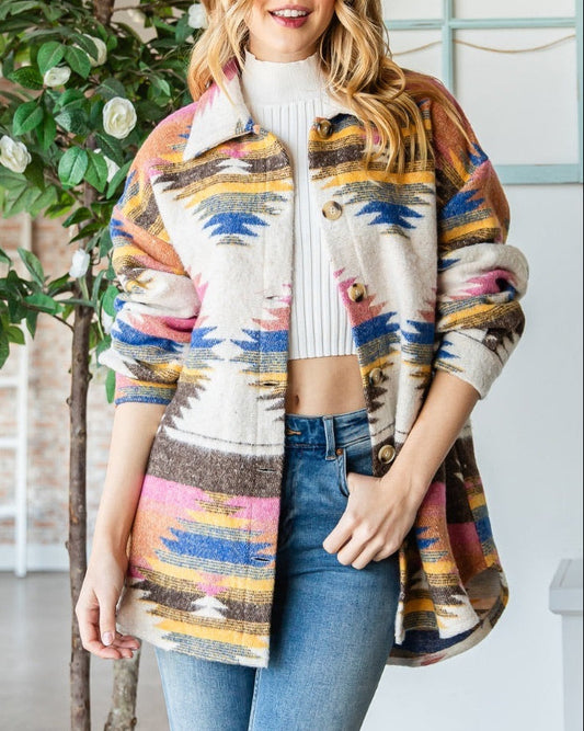 Ivory shacket with multicolor Southwest pattern and oversized fit.