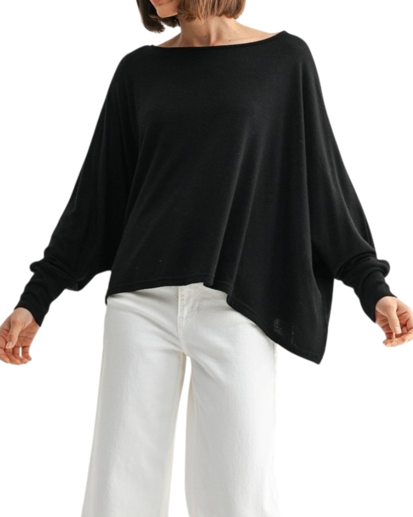 Black oversized and lightweight long sleeve top worn by a person on a white background.