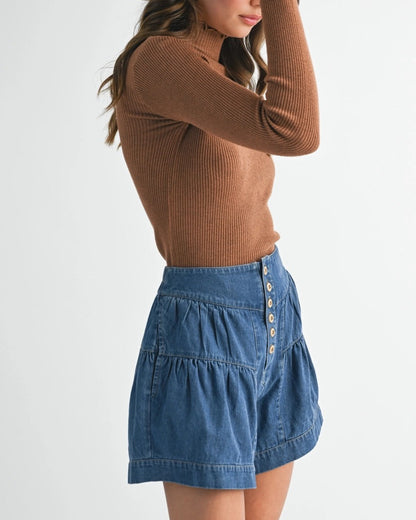 Caramel mock neck rib knit top with lettuce trim and long sleeves.