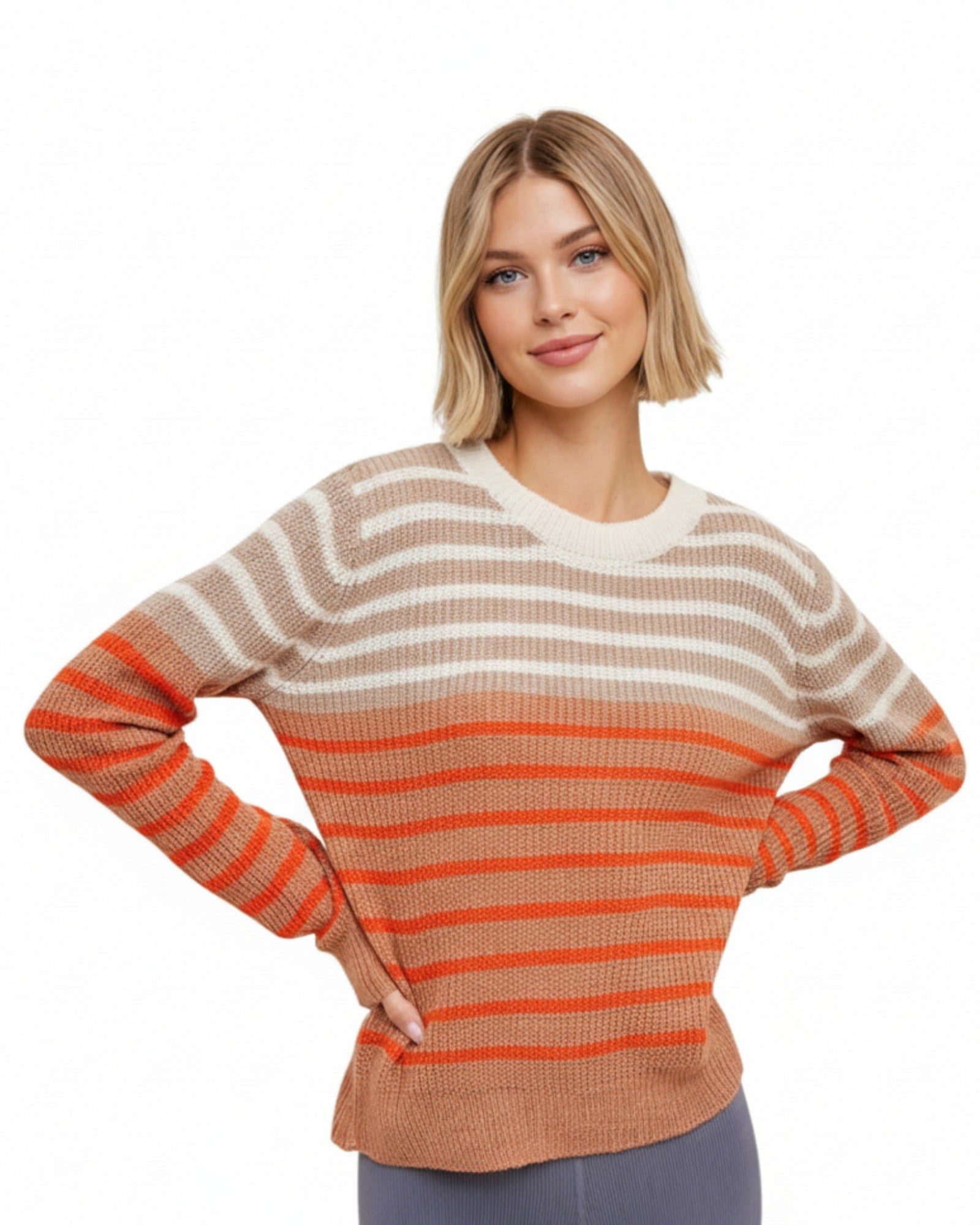 Woman wearing a striped sweater with orange and beige colors on a white background