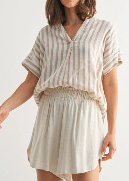 Taupe and ivory striped dolman cotton top with button details on back.