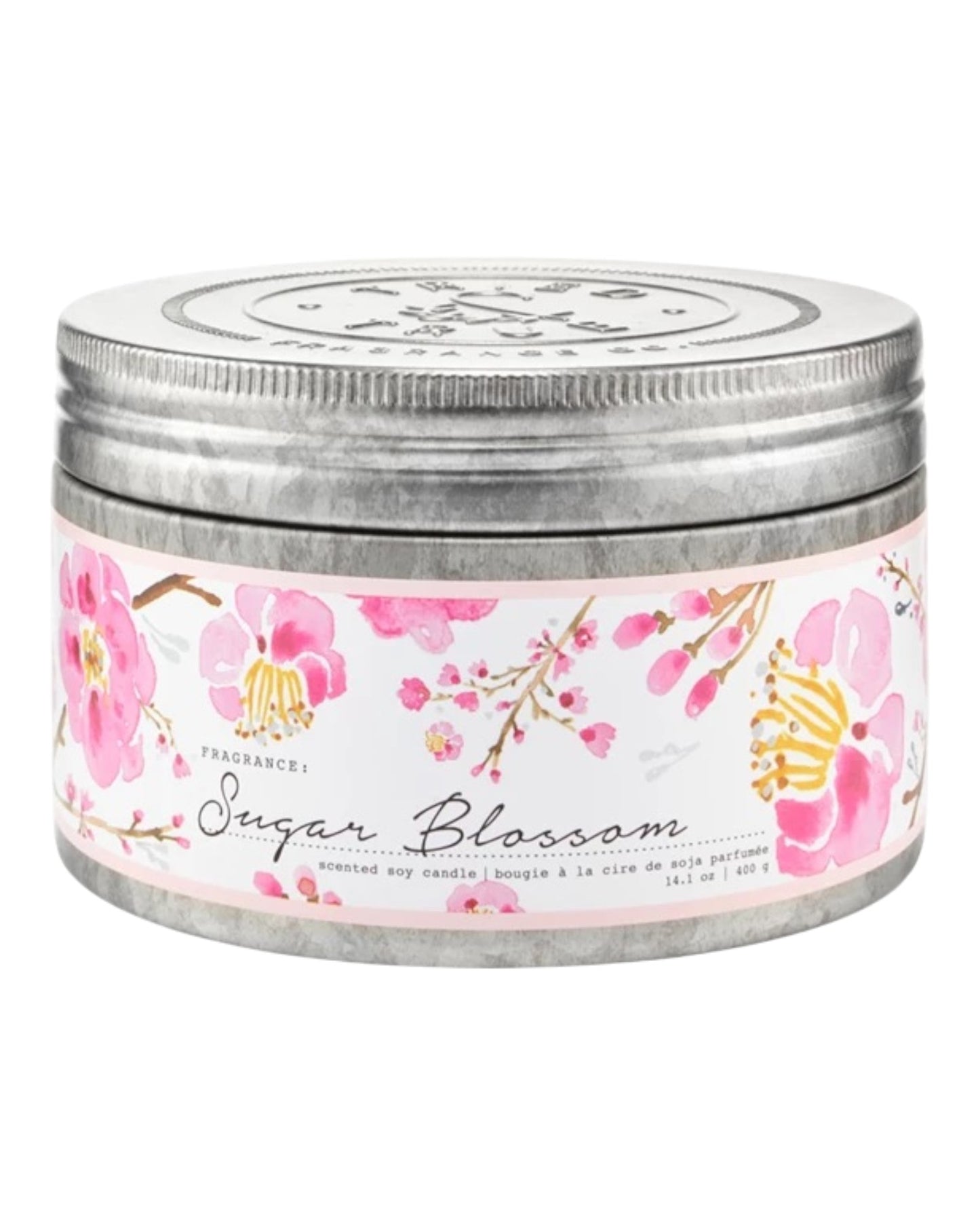 Candle jar with floral label on a white background.