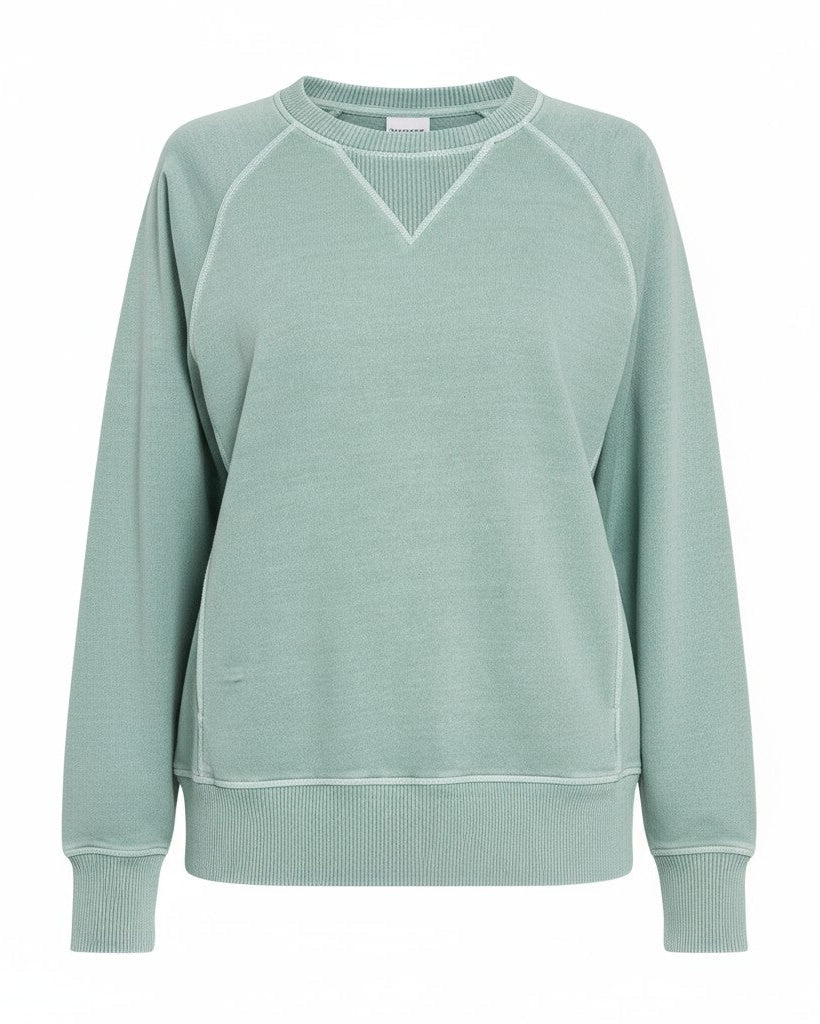 Pigment-dyed 100% cotton French terry pullover in Ash Blue with pockets, ribbed trim, and relaxed, oversized fit.