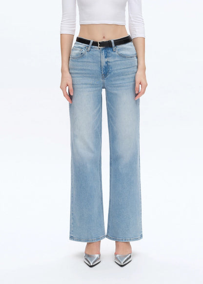 Woman wearing Wide Straight Leg Comfort Stretch Jeans in Swiss Blue with a Black Belt. 