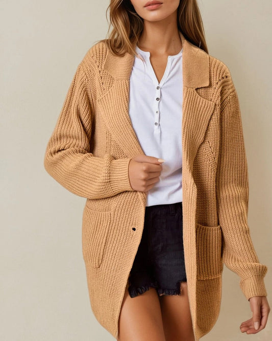 Acorn ribbed sweater blazer with oversized fit and lapel collar. 