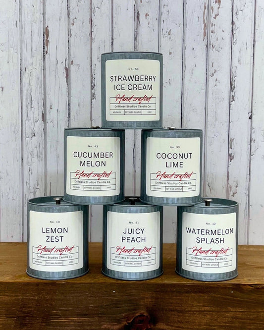 Hand-poured soy candles in galvanized tins with fruity, fresh and seasonal scents made in Wisconsin.