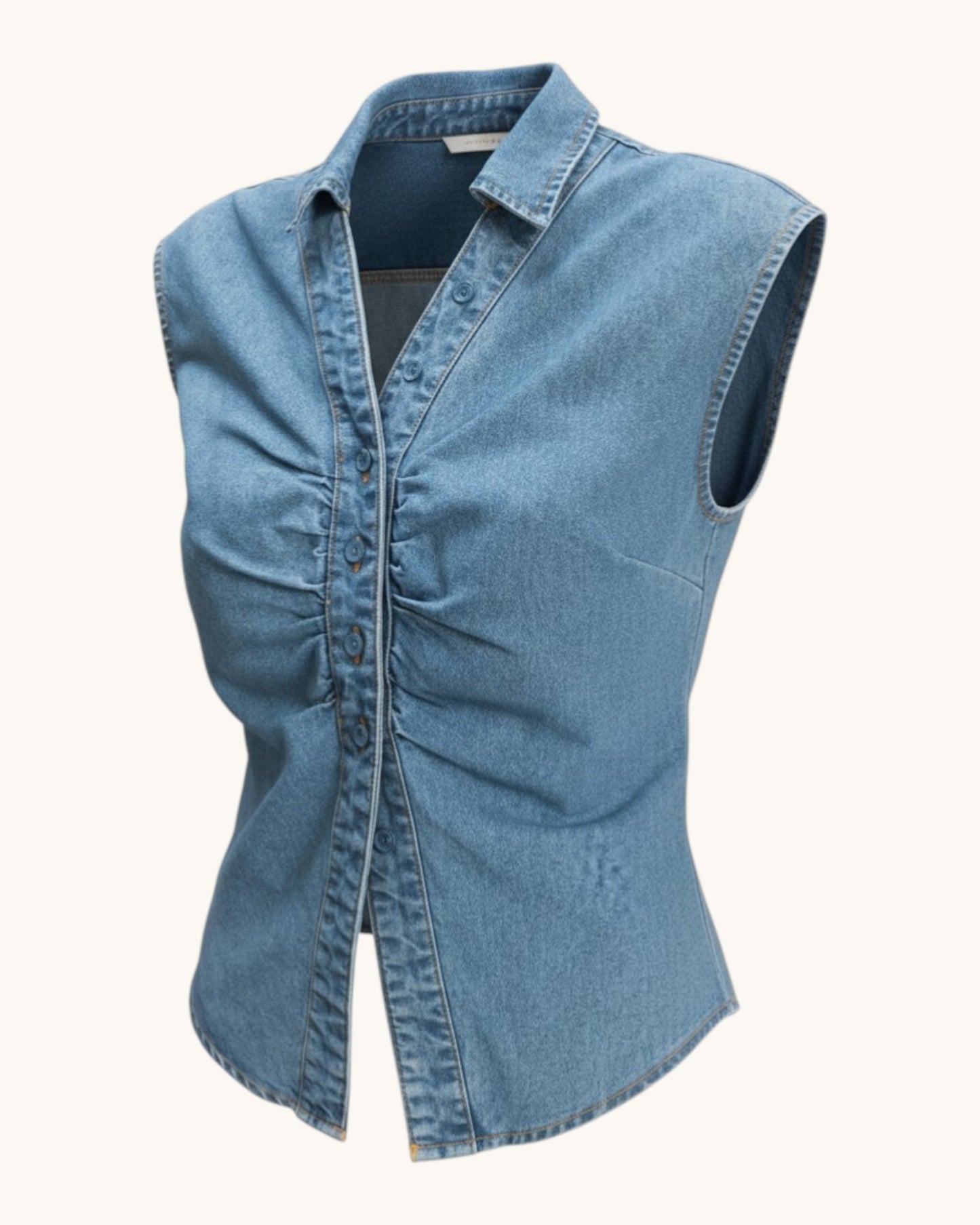 Blue denim vest on a white background.