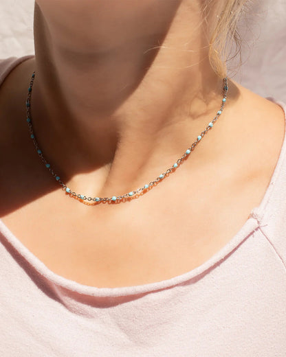Turquoise Bead Choker Necklace on silver chain.
