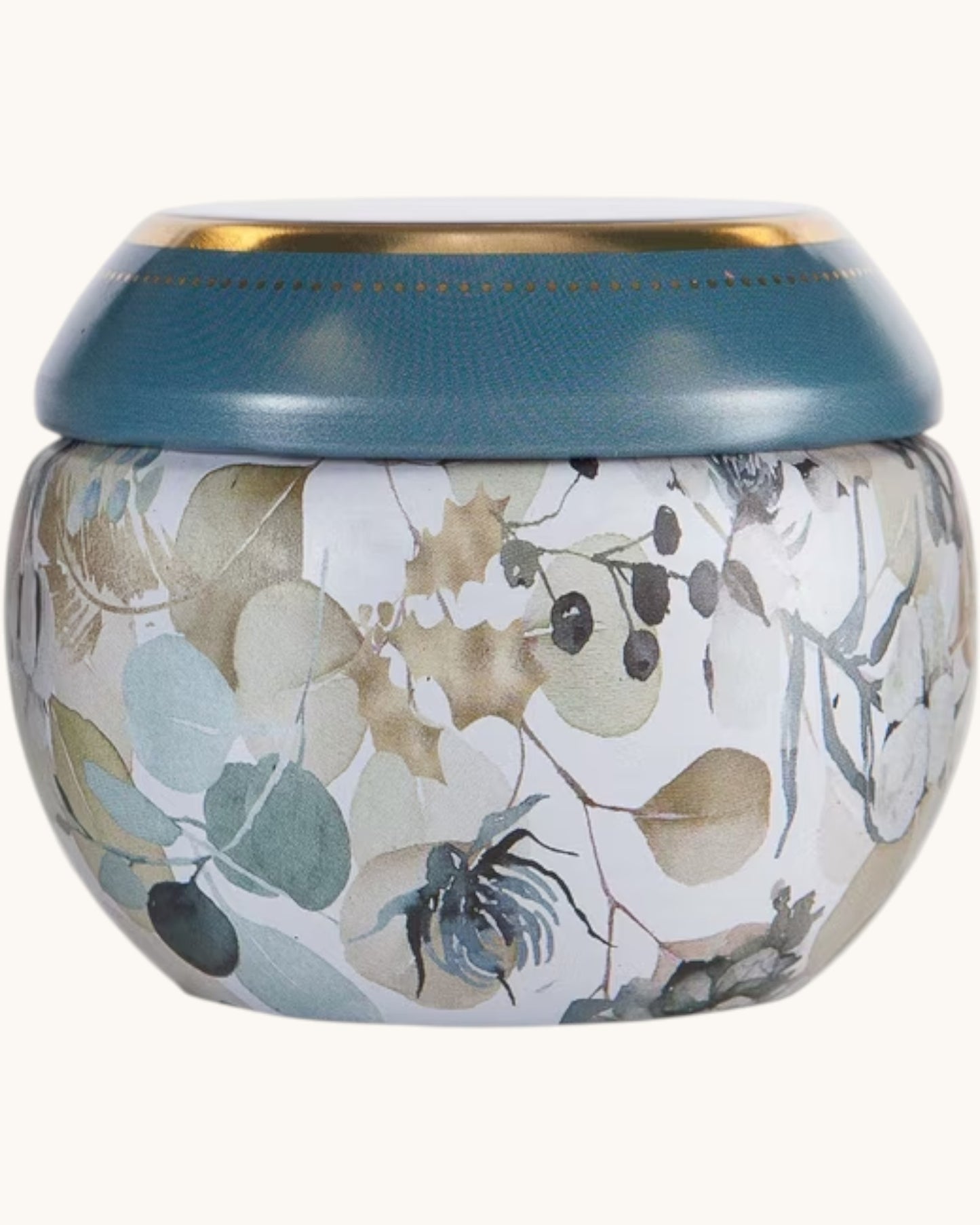 A round decorative jar with a textured teal-blue lid and a white body decorated with a botanical pattern of leaves and berries in muted beige, gray, and blue-green tones.
