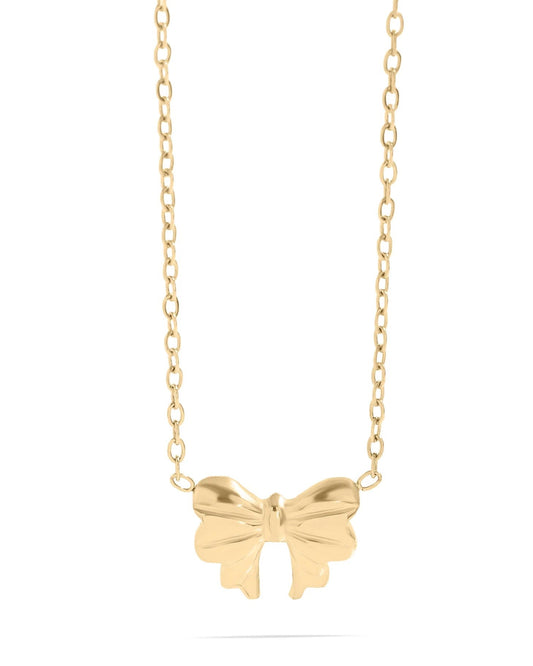 Gold bow necklace on a white background.