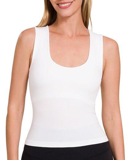 White seamless cropped tank top with built-in bra and scoop neckline.