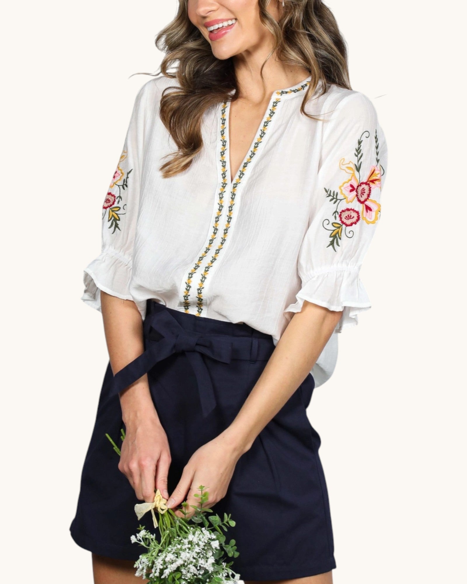 Boho Marigold Embroidered Blouse in off-white with floral embroidery detail, front view