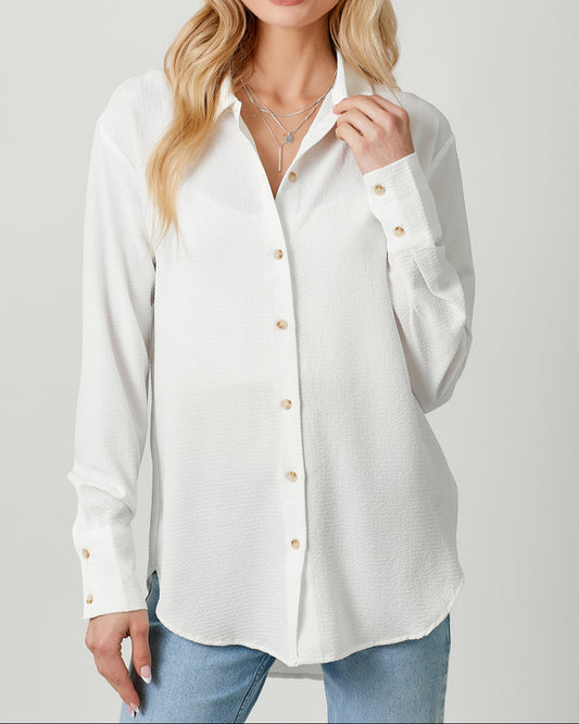 White textured lightweight button-down shirt with collared neckline.