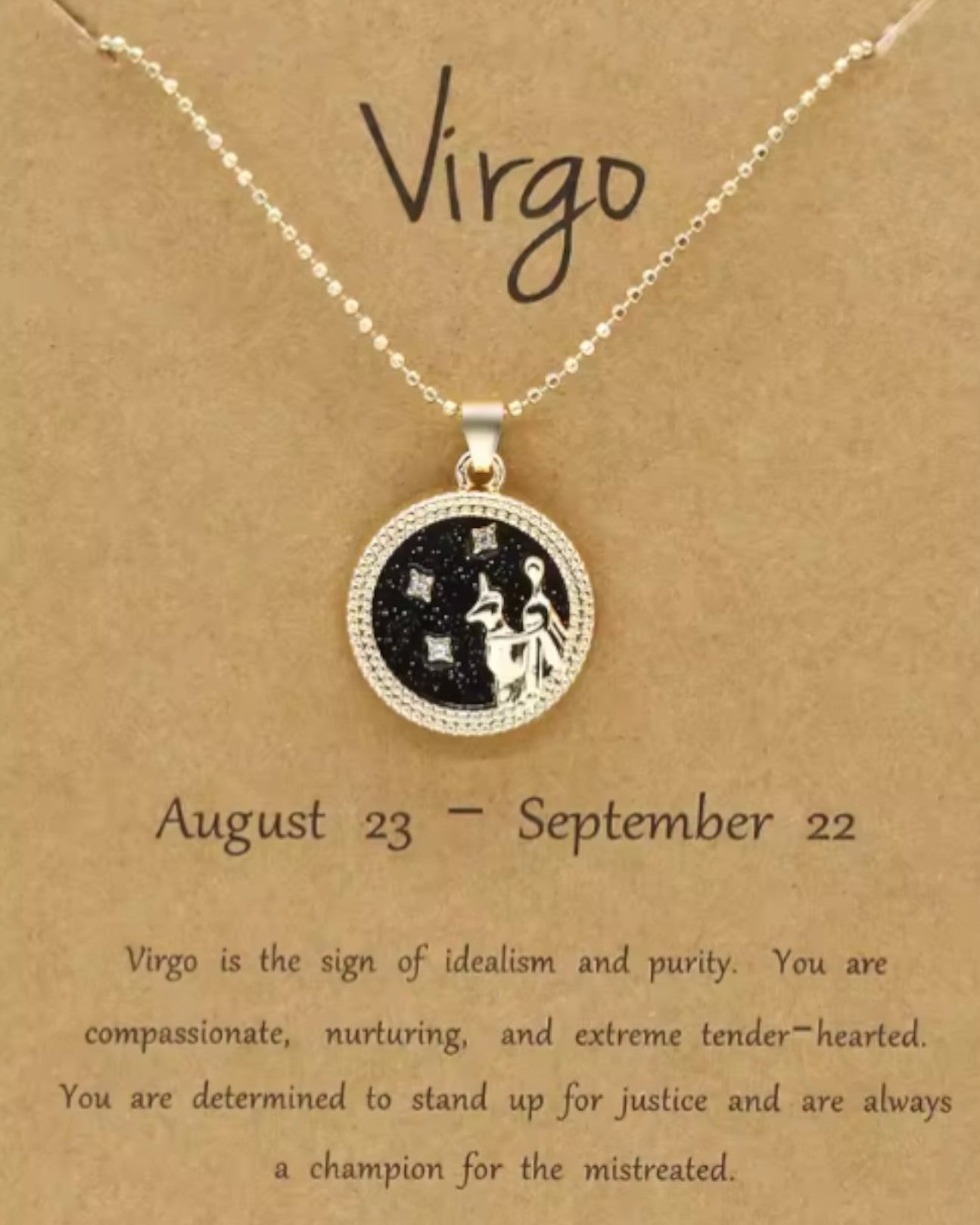 Necklace with Virgo zodiac symbol on a brown card with text.