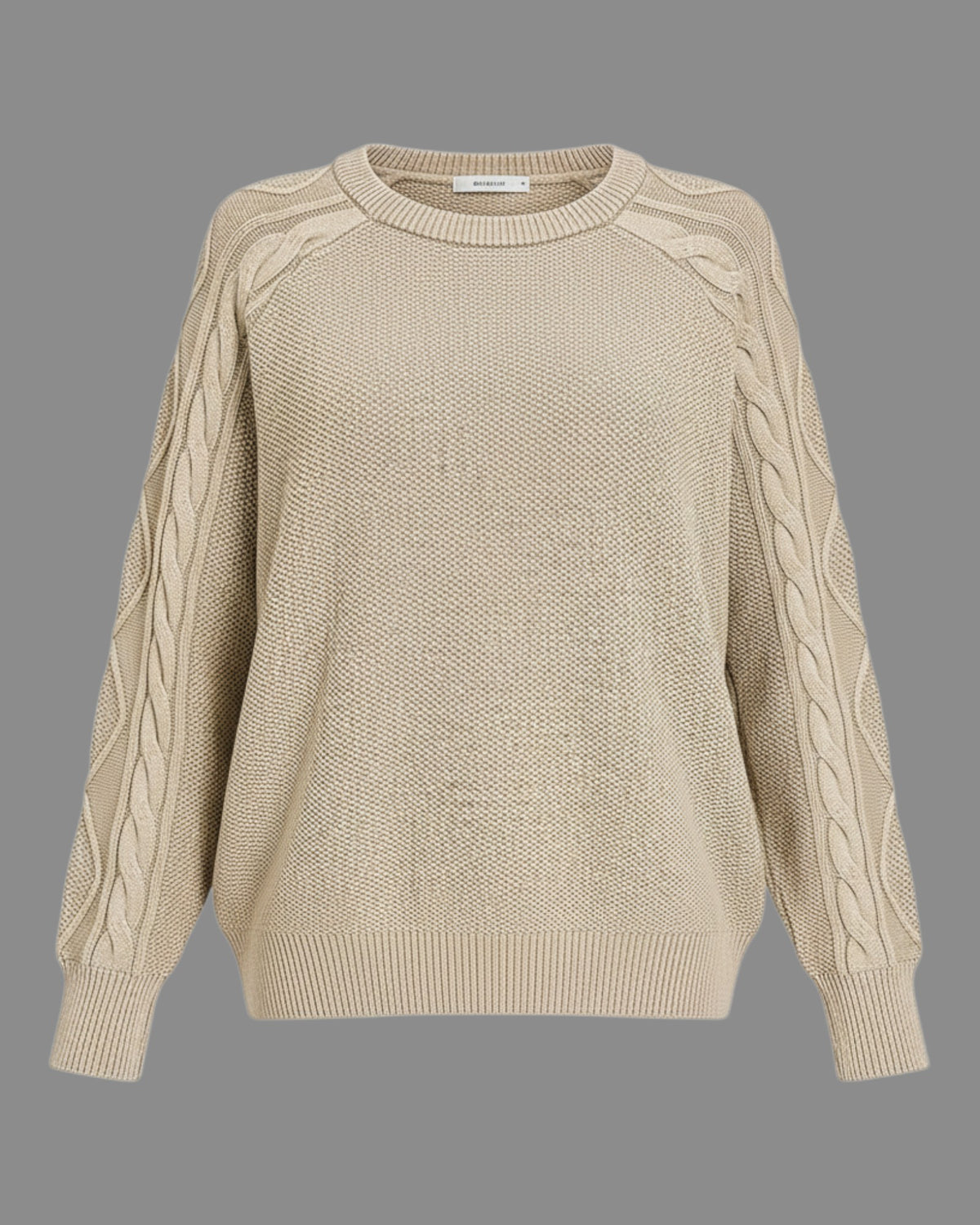 A beige crewneck knit sweater with textured cable detailing down the sleeves, shown against a solid gray background.