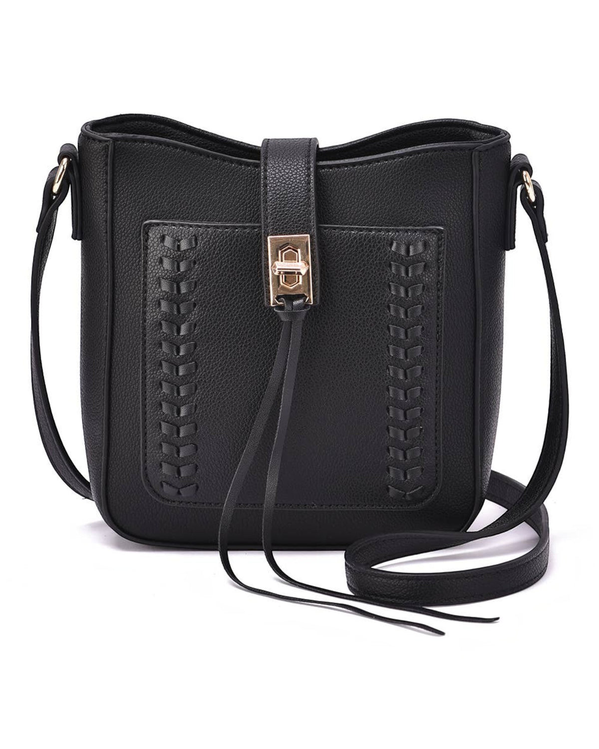 An everyday medium sized black faux leather crossbody bag with whipstitch detailing and a front tassel with gold hardware. 