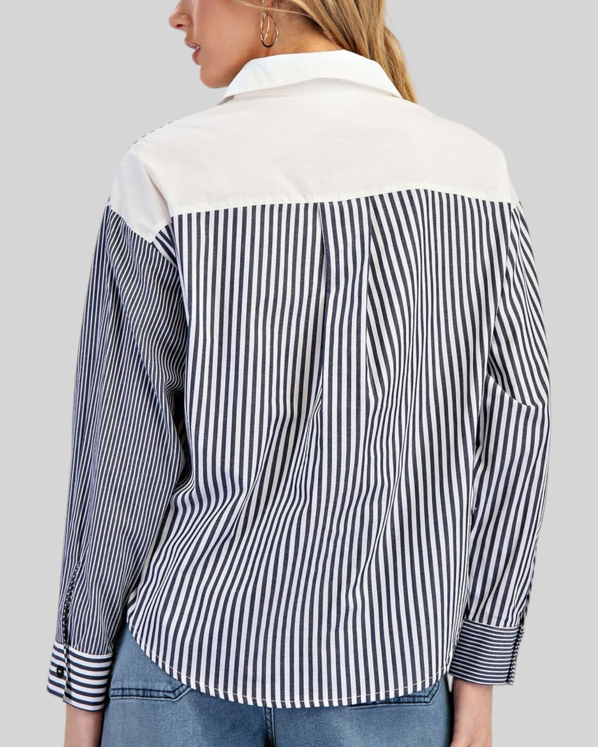 Back view of a charcoal and white button down shirt.