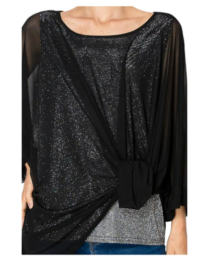 Woman wearing the Starry Night Black Sparkly Tunic Top and jeans. 