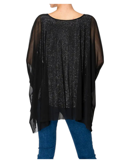 Woman wearing the Starry Night Black Sparkly Tunic Top and jeans. 