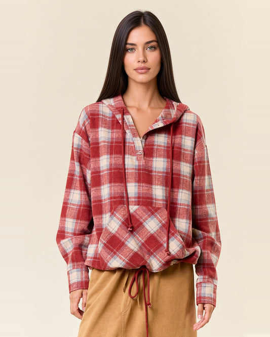 Front view of cranberry plaid flannel hoodie with a partial button placket, kangaroo pocket and drawstring hem.