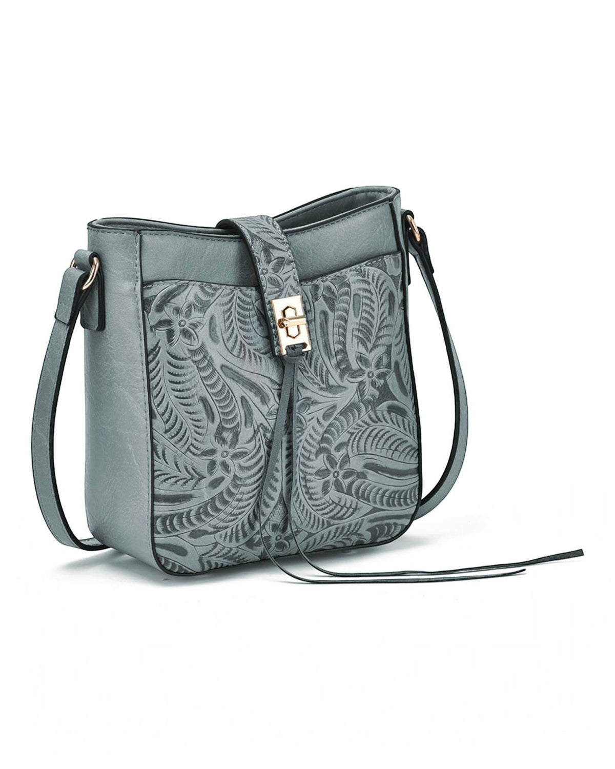 A slate blue leather crossbody bag with a detailed embossed floral and leaf pattern on the front flap, featuring a gold-tone metal clasp and a matching leather shoulder strap, shown on a plain white background.