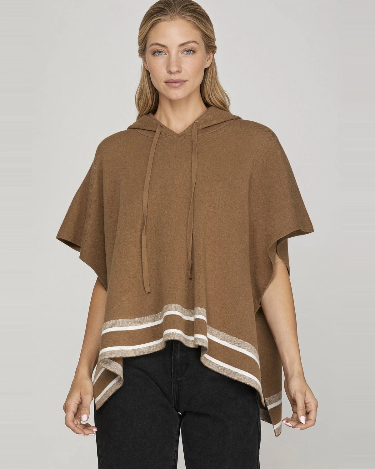 Front view of mocha brown short sleeve knit hoodie cape showing drawstring hood, relaxed fit, and cream contrast striped hem.