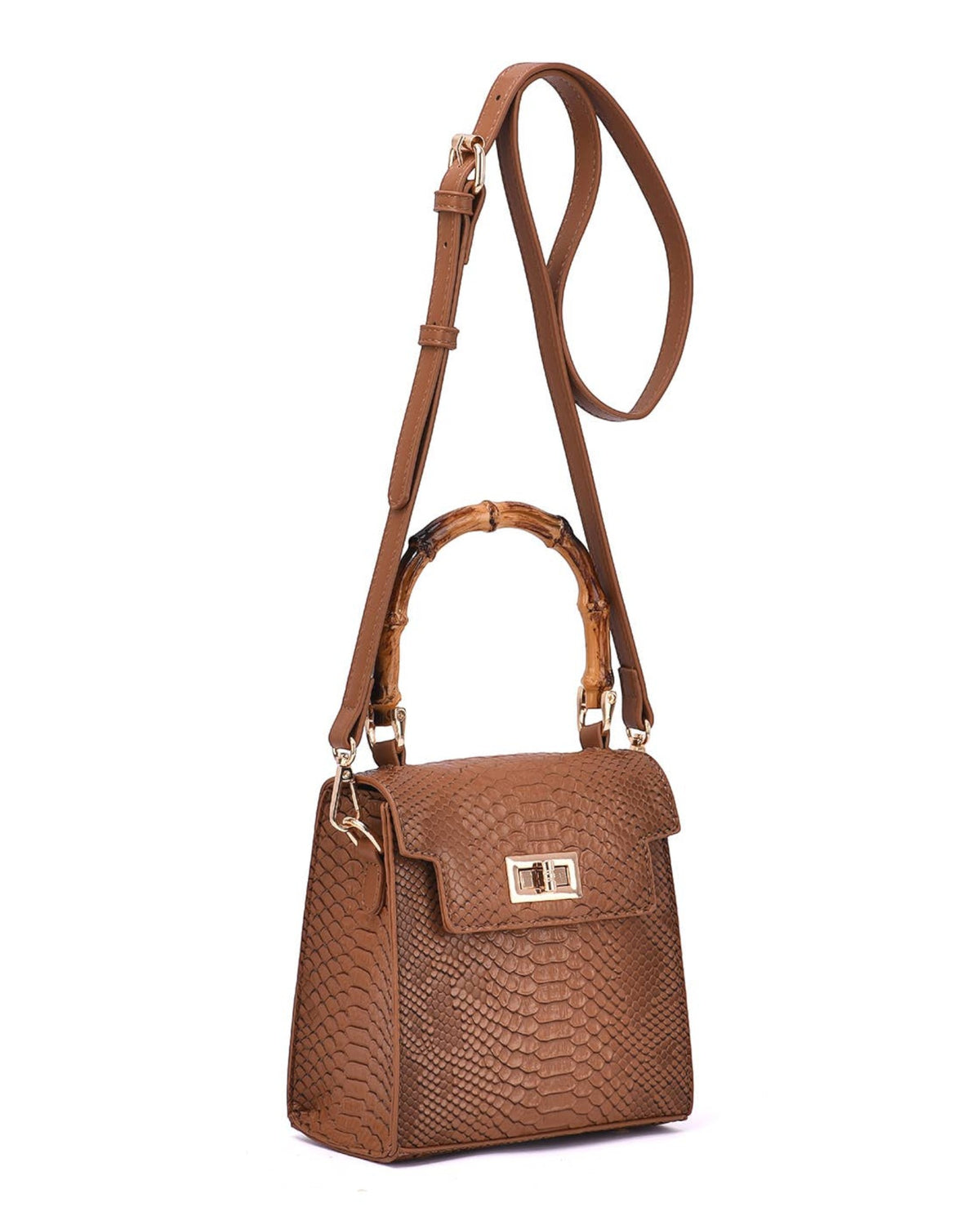 A brown textured faux-snakeskin handbag with a top handle, a long detachable shoulder strap, and a gold-tone turn-lock clasp on a white background.