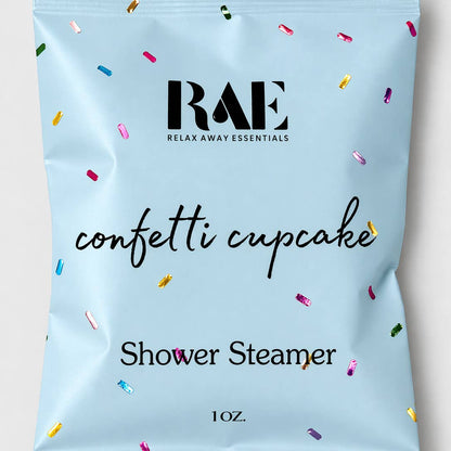 Shower steamer packaging with 'RAE' branding and confetti design on a light blue background.