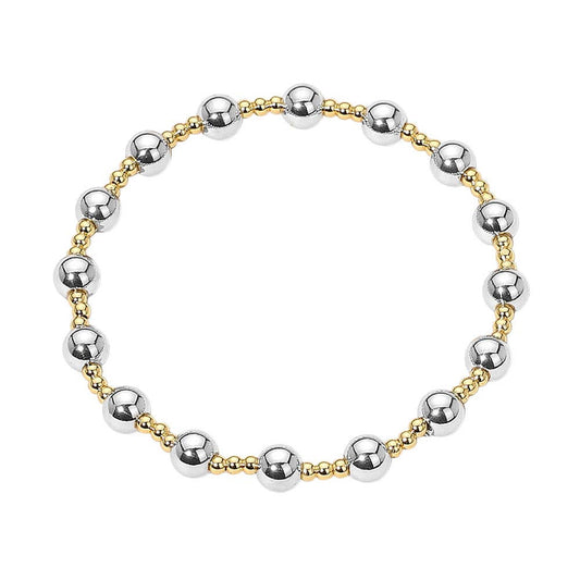 Bracelet with alternating gold and silver beads on a white background.