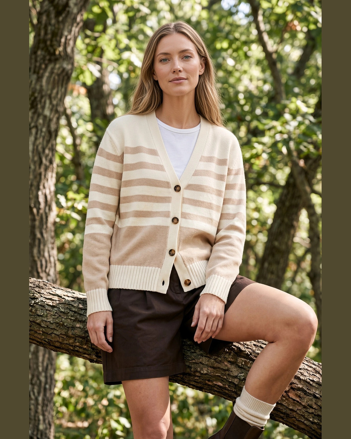 Front view of taupe and cream striped cardigan showing V-neckline, four buttons, and ribbed hem.