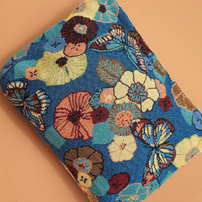 Blue embroidered floral make up bag. 