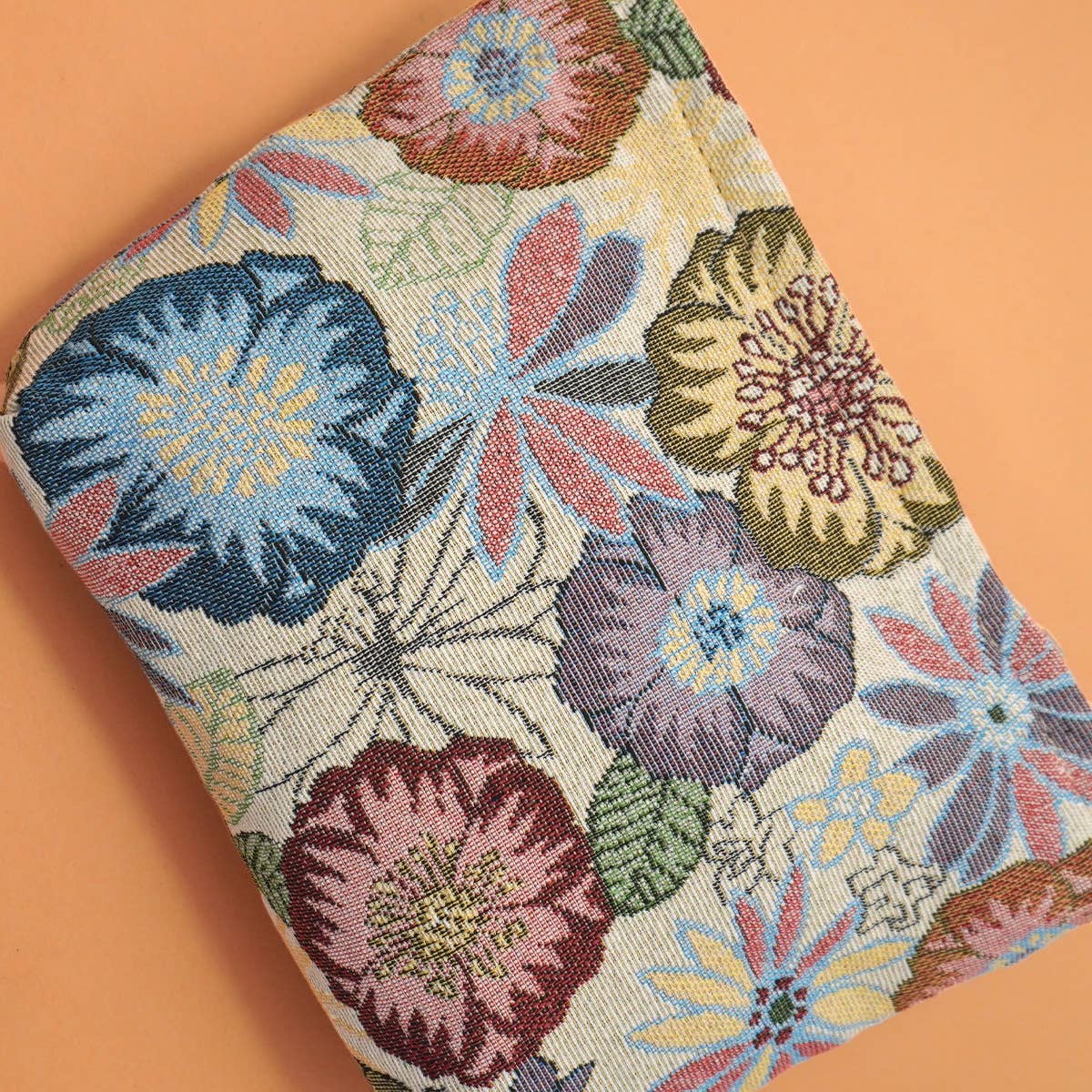Ivory floral embroidered make-up bag. 