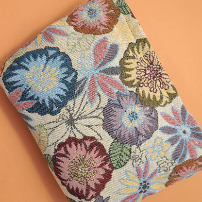 Ivory floral embroidered make-up bag. 